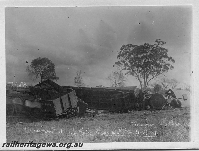 P01050
Derailed loco, EC class 247 and wagons including R class 3546 at the 66 mile point, Mokine, ER line, view from Northam end along the track.
