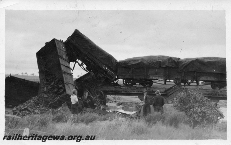 P01054
1 of 4 views of the derailment of No105 Mixed near Dumberning, BN line on the 14th of March, 1934, GA class wagon lifted into the air
