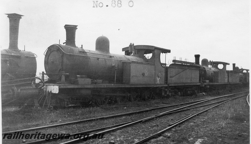 P01648
O class 88, in storage with other locos at Midland Junction, front and side view, c1926
