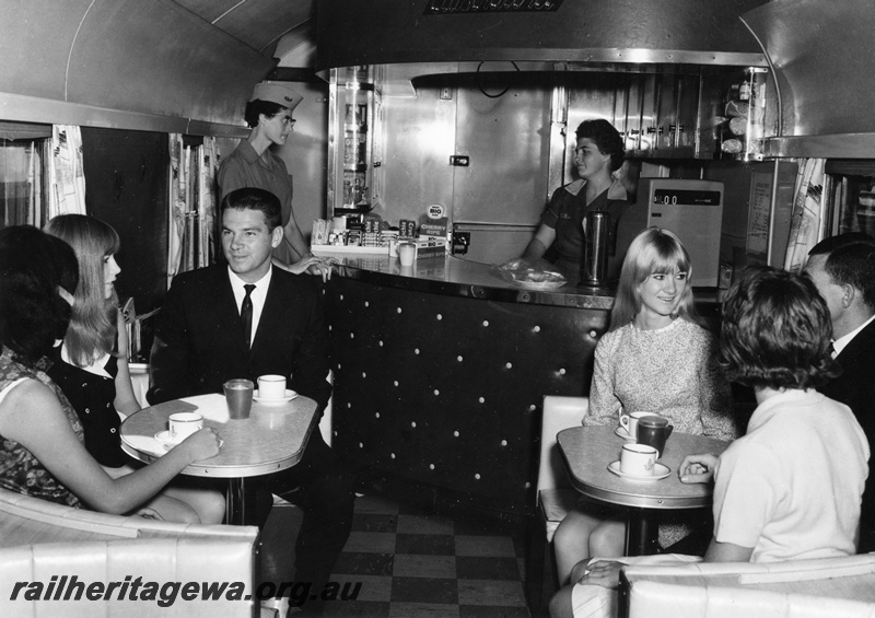 P01931
AYD class buffet car, interior view showing passengers at the tables and staff at the counter
