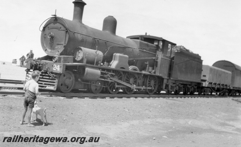 P02056
Commonwealth Railways (CR) G class 24, on the Nullarbor, TAR line, front and side view, c1940.
