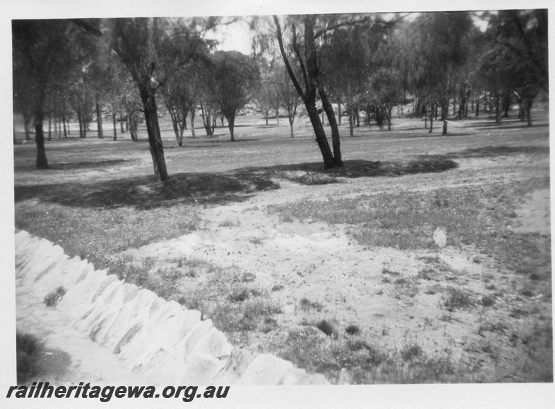P02161
2 of 3 images of the construction of the water catchment Badgarning, 7kms west of Wagin not on a railway line, shows the channel.
