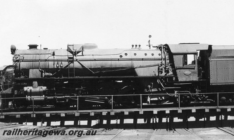 P02518
V class 1220 steam locomotive on the turntable at Bunbury, side view, SWR line.
