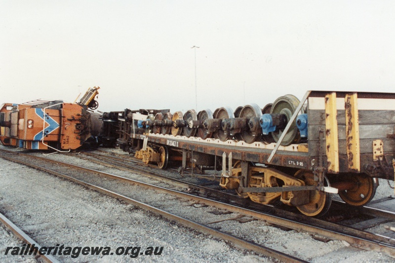 P02568
6 of 8, Derailment showing MA class 1862 diesel locomotive on its side, front view, Forrestfield marshalling yard.
