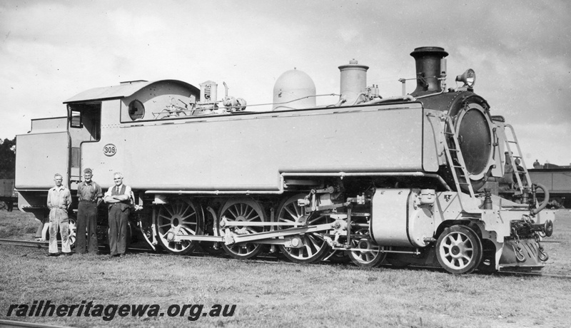 P02874
DM class 308 steam locomotive, loco crew and sub-foreman Frank Blinco standing alongside, photographic grey, side view.
