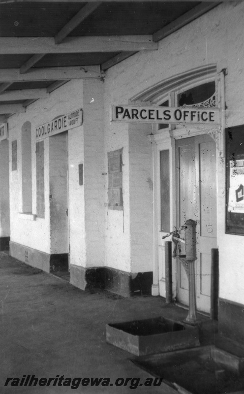 P02910
Station building showing nameboard and parcels office, scales, Coolgardie, EGR line.
