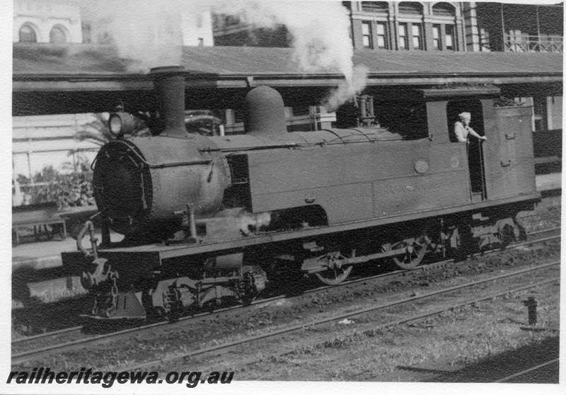 P03025
N class 258 steam locomotive, running light engine, front and side view, Perth station, ER line.
