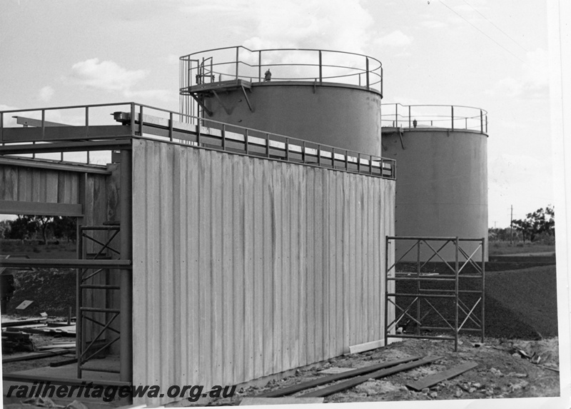 P03185
Construction of shed, fuel tanks in the background, Picton, SWR line.
