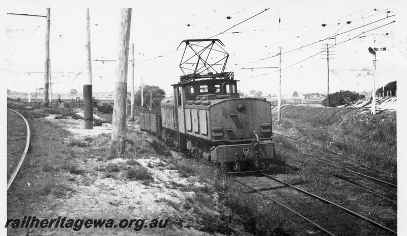 P03208
SEC No.1 electric locomotive under catenary, side and end view, East Perth.

