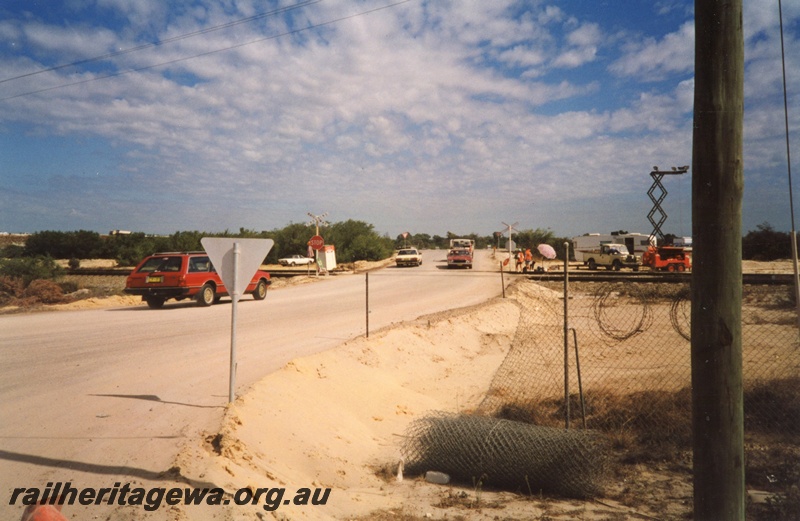 P03291
Level crossing, temporary road crossing over the standard gauge tracks at the southern end of Forrestfield Yard, Landbridge Project.
