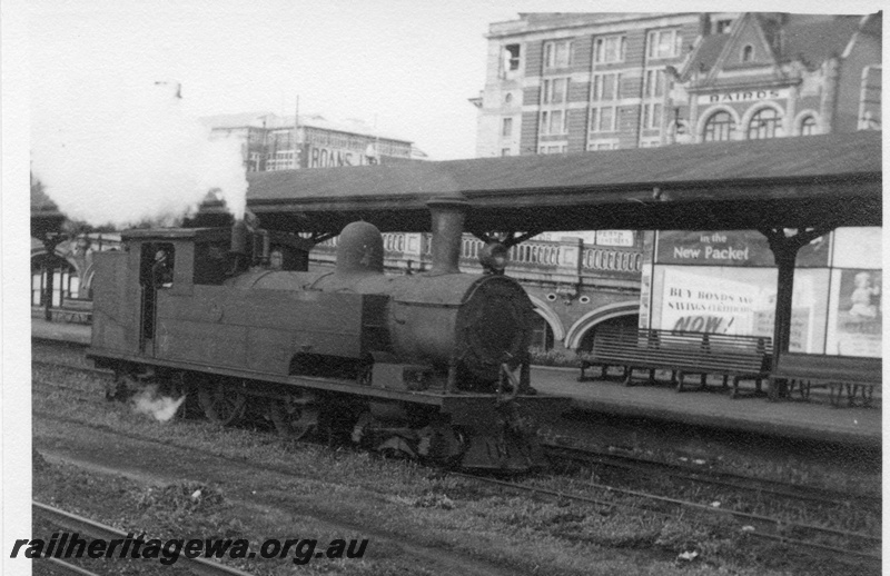 P03494
N class 27,4.4.4T,at Perth station, Side and Front view, Background Bairds and Boans Stores Perth
