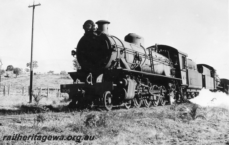 P03532
W class 905 back to back with another W class, telegraph pole with a single crossarm, front and side view, location Unknown

