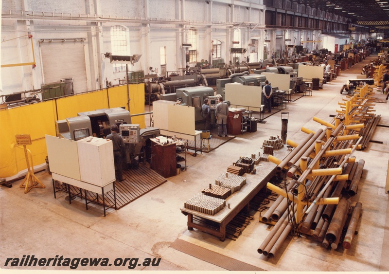 P03853
1 of 2 Machine shop, block 3, Midland Workshops. View of numerical lathes down the length of the room left to right. 
