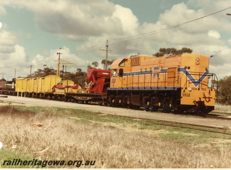 P03871
1 of 3, A class 1512 diesel locomotive on mixed goods train, side and front view, Westrail orange livery, on route to Geraldton.
