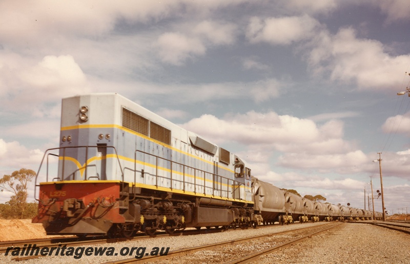 P03921
L class 266 standard gauge diesel locomotive, front and side view, in dark blue livery, on nickel train, WNA class nickel ore wagons, en route to West Kalgoorlie, standard gauge line. 
