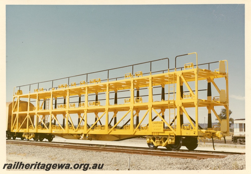 P03988
1 of 3, WMB class 34029 standard gauge triple deck motor vehicle carrying wagon, side and end view, new, yellow livery, Forrestfield.
