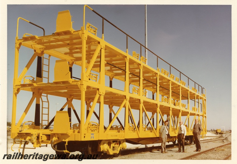 P03990
3 of 3, WMB class 34029 standard gauge triple deck motor vehicle carrying wagon, end and side view, new, yellow livery, Forrestfield.
