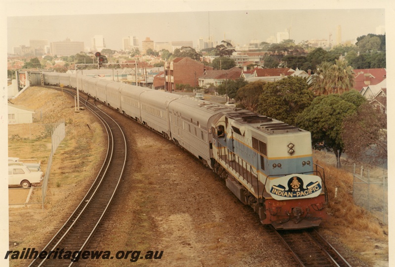 P04134
L class 253 in original livery with the Indian Pacific headboard departing the East Perth Terminal approaching Mount Lawley.
