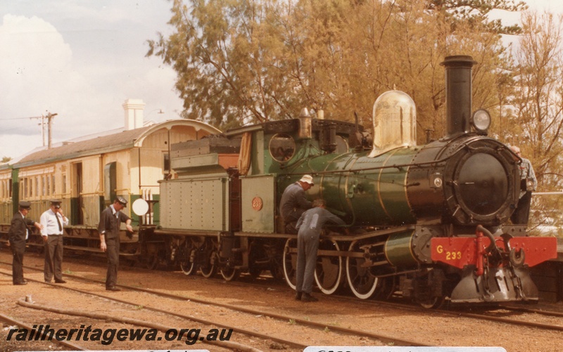 P04292
2 of 2, G class 233 steam locomotive, side and front view, in workshopped condition, on a passenger train, Busselton, BB line.
