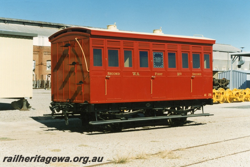 P04296
2 of 2, AI class 258, W.A.'s first passenger carriage restored at Midland workshops, end and side view.
