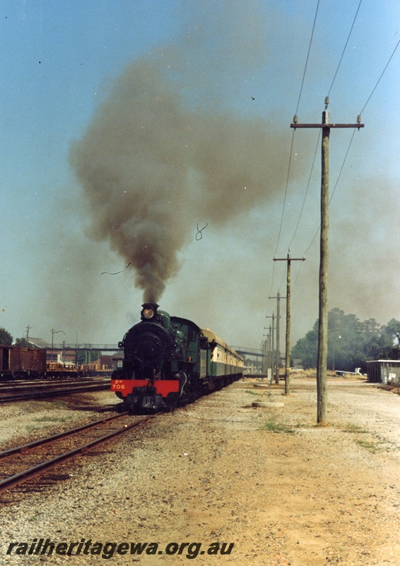 P04303
PM class 706 steam locomotive, front view, on passenger train, departing Midland, ER line.
