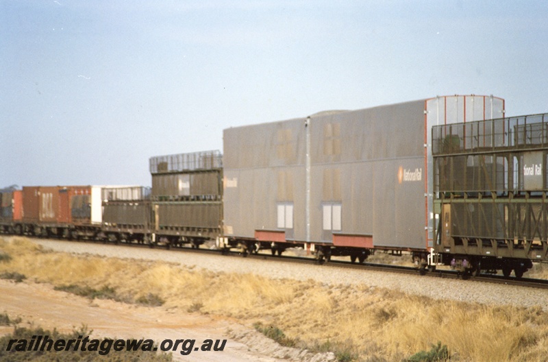 P04307
Triple deck car carrier with enclosed sides on freight train, Tammin, standard gauge line.
