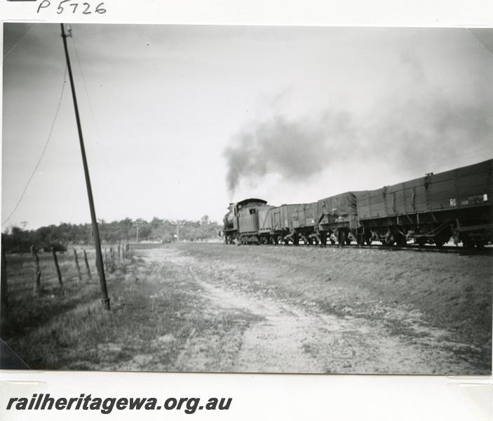 P05726
MRWA loco A class 26, departing Mingenew, MR line, goods train with a WAGR RD class wagon in train.
