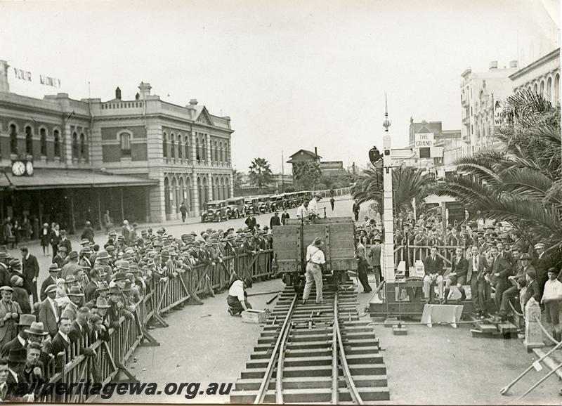 P05794
Perth Station forecourt, tracklaying demonstration, large crowd looking on, looking east
