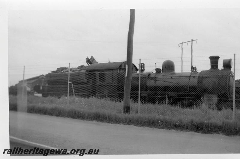 P06538
FS class 363, Wood depot, East Perth loco depot, tender being loaded with firewood

