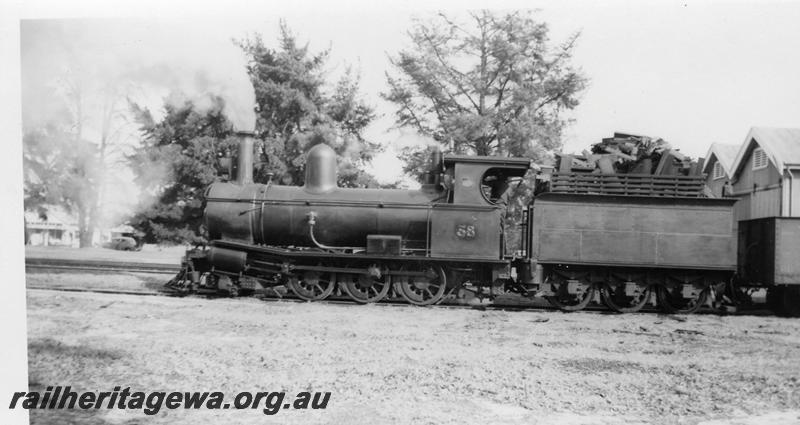 P06579
Millars loco No.58, Mundijong, side view, partial view of the goods shed in the background.
