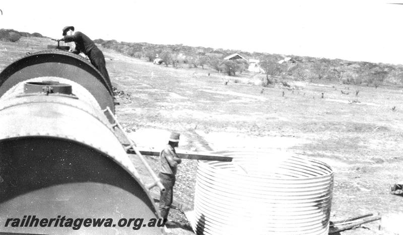 P07292
7 of 19 photos of the construction of the railway dam at Wurarga. NR line, filling roadside water tanks from railway tank wagons
