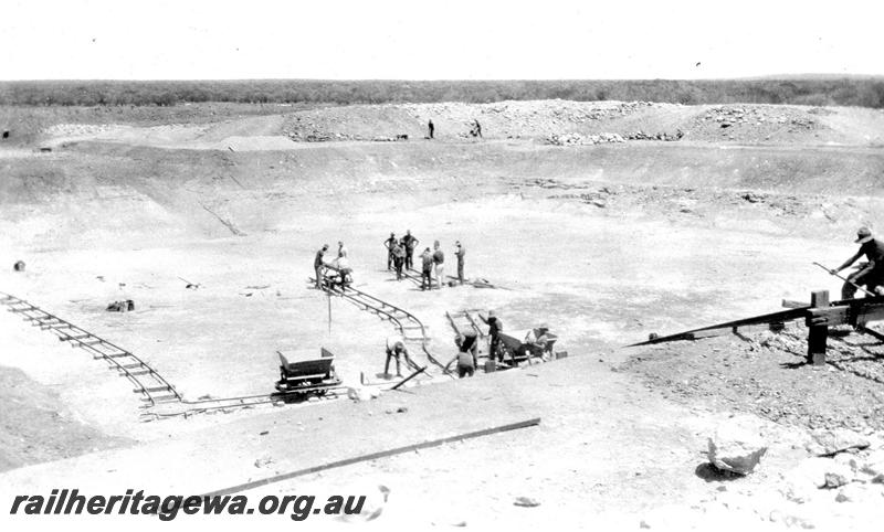 P07296
11 of 19 photos of the construction of the railway dam at Wurarga. NR line, excavation complete, shows narrow gauge track and hopper wagons
