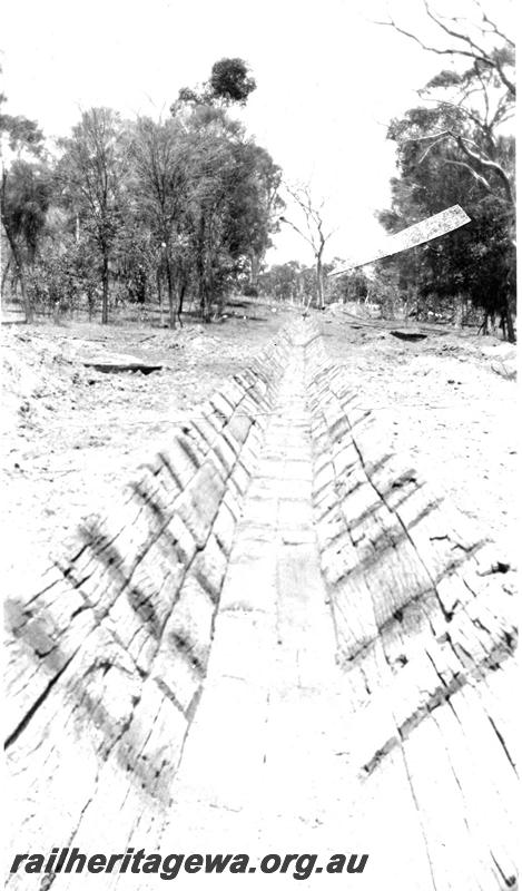 P07339
3 of 15 views of the construction of the railway dam at Williams, BN line, looking along sleeper lined drain
