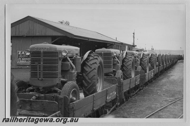 P07526
H class wagons all loaded with Chamberlain tractors
