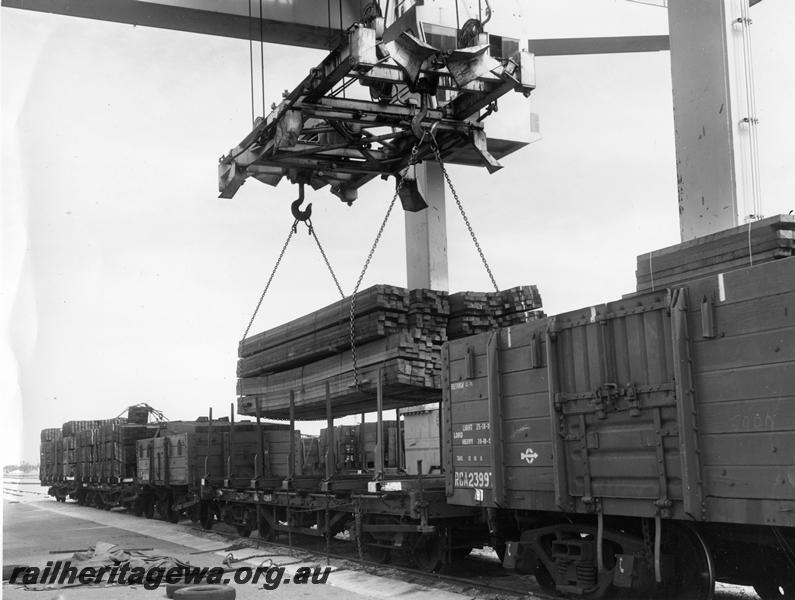 P07528
RCA class 23997, QBB class wagon, being loaded with timber. 
