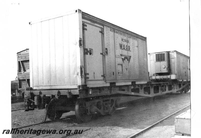 P07651
WFX class standard gauge flat wagon (later reclassified to WQCX), with refrigerated containers on board, end and side view.
