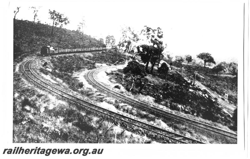 P07680
QA class on mixed train descending the Zig Zag on the UDRR line, approaching No.2 points, Stathams Siding leading to quarry bottom RH of photo
