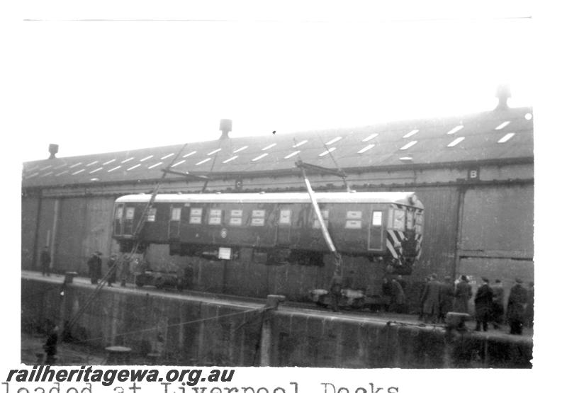 P07743
2 of 4 views of ADG class railcar on docks at Liverpool, UK being loaded on to ship
