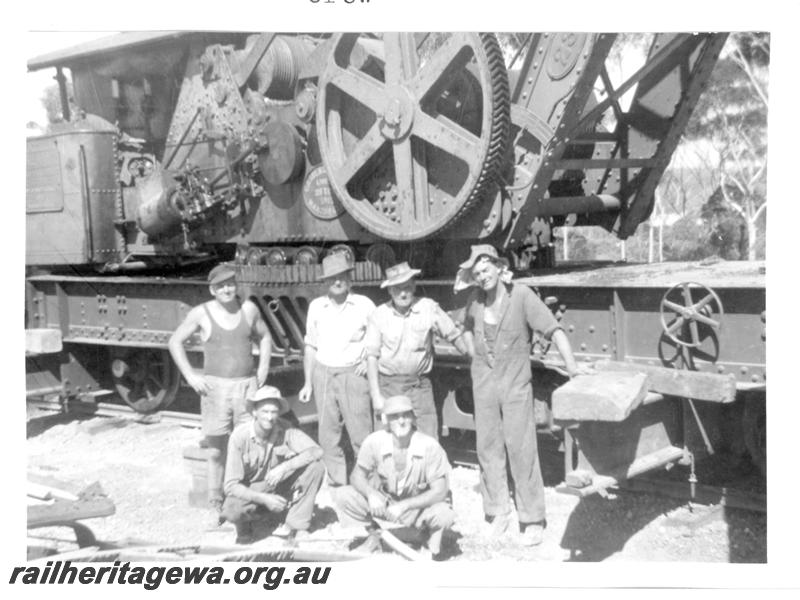 P07750
1 of 6 views of a derailment at Norseman, CE line on 31.1.1962. Ted Bosworth was the Officer In Charge of the Breakdown crew, Breakdown crew posing in front of crane No.23
