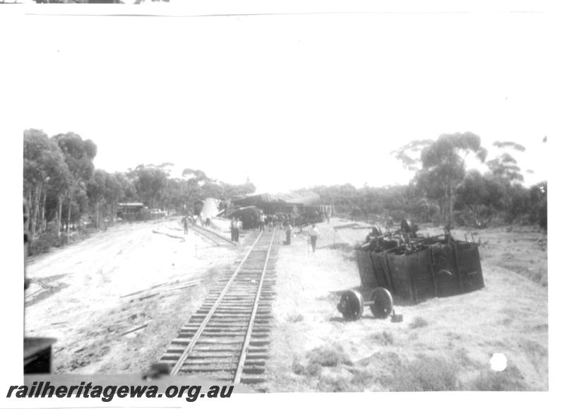 P07754
5 of 6 views of a derailment at Norseman, CE line on 31.1.1962. Ted Bosworth was the Officer In Charge of the Breakdown crew. General view of derailment.
