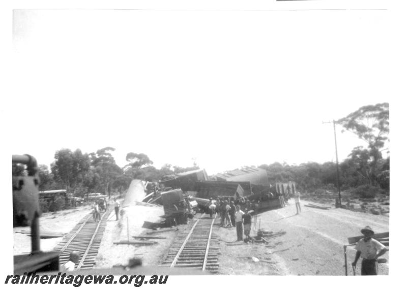 P07755
6 of 6 views of a derailment at Norseman, CE line on 31.1.1962. Ted Bosworth was the Officer In Charge of the Breakdown crew. General view of derailment

