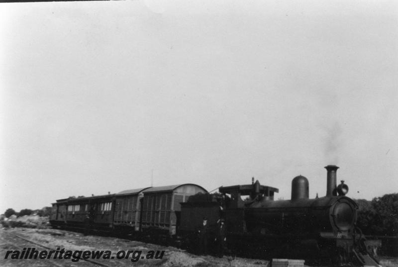 P08044
G class loco, hauling mixed train at an Unknown location
