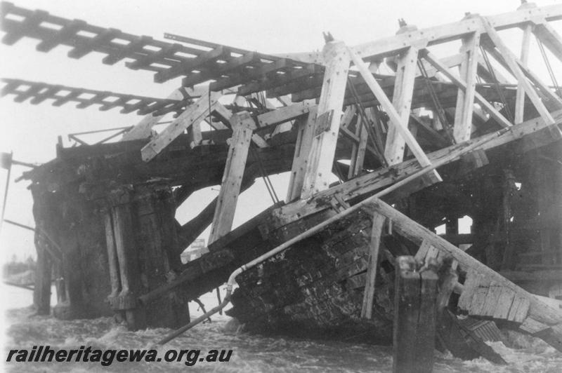 P08051
North Fremantle railway bridge after collapse, view up river towards East Fremantle.
