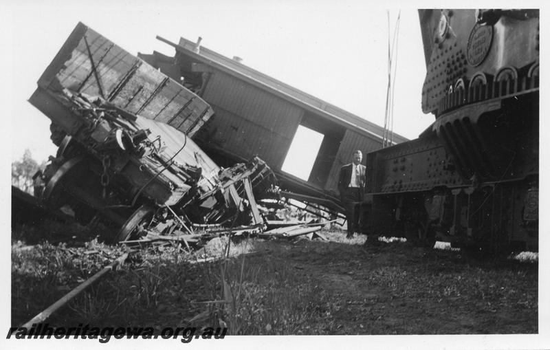 P08133
2 of 7 views of the collision at Yarloop, SWR line, by a train headed by W class 951 and a stationary goods train. wrecked wagons and Z class 65 clerestory roofed brakevan, the 25 ton breakdown crane in the view
