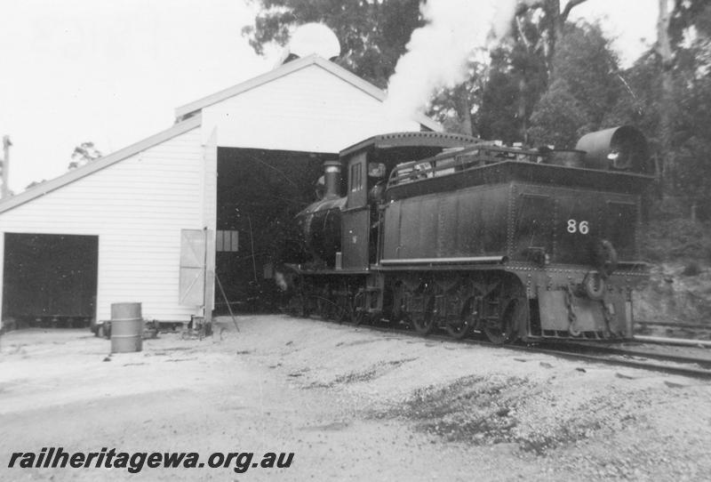 P08163
Bunnings loco No.86, loco shed, Donnelly River Mill, end and side view, other side to P8162. Same as P4444 but better quality.
