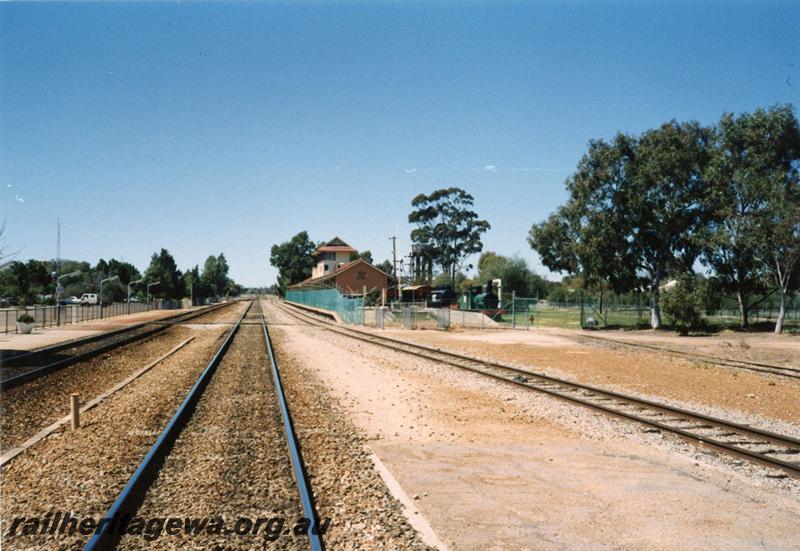 P08450
Merredin, station building, signal box, narrow gauge, view from SG platform, EGR line. Distant view, some of preserved rolling stock visible.
