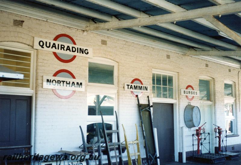 P08484
Northam, station building, narrow gauge, view of part of wall on platform, ER line, WAGR nameboards for Quairading, Northam, Tammin, Burges, part of Westrail nameboard for Kwolyin.
