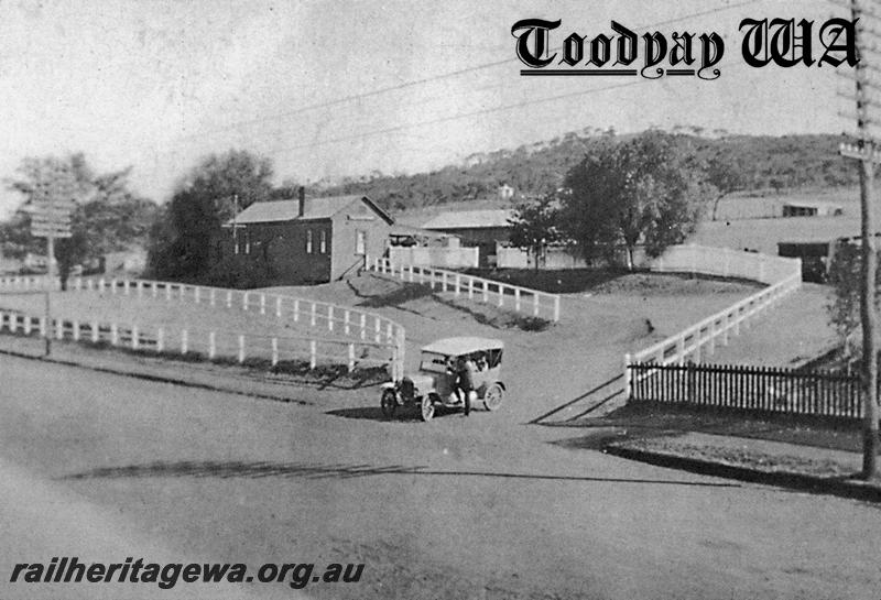 P08699
Station buildings, Toodyay, CM line, street side view, period car in the foreground

