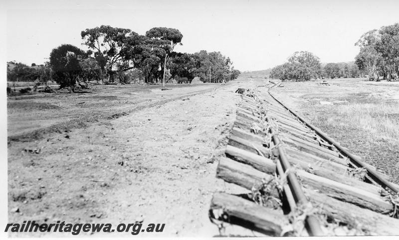 P08867
3 of 15 views of the aftermath of the washaway at Coondle, CM line on the 3rd of March 1934, view of displaced track.
