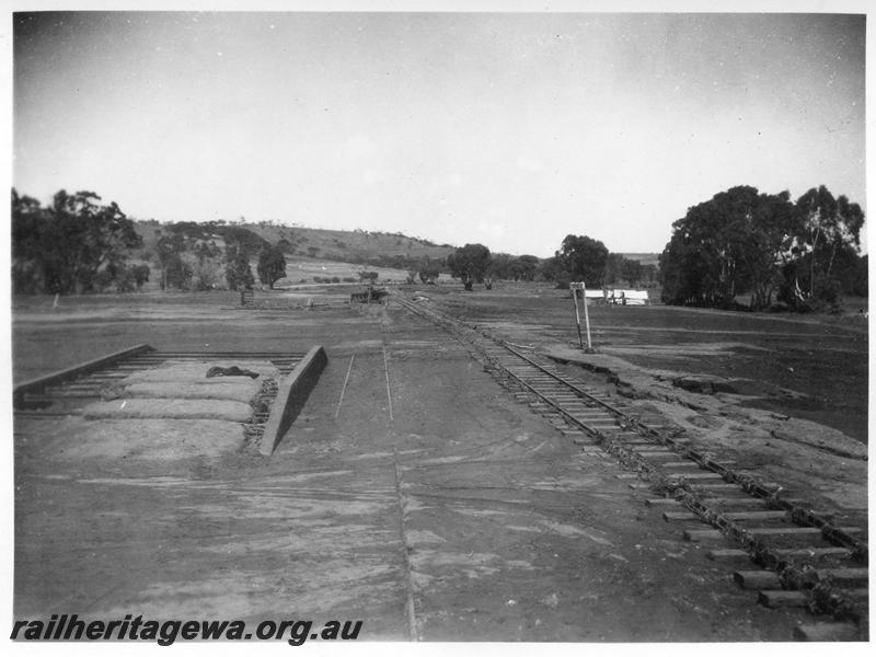 P08872
8 of 15 views of the aftermath of the washaway at Coondle, CM line on the 3rd of March 1934, view of siding with the flood damaged loading platform
